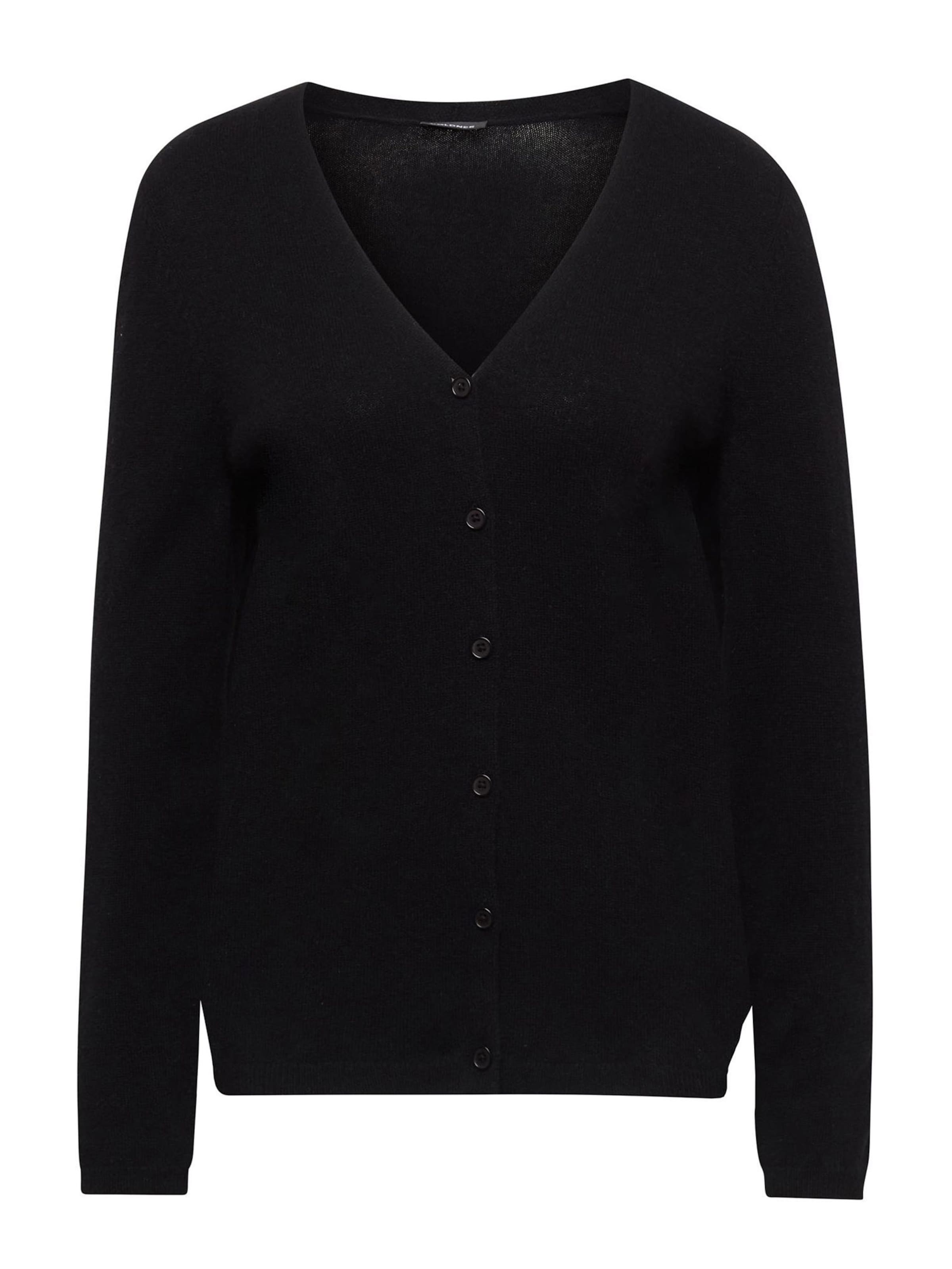 Goldner Strickjacke in Schwarz: Vorderseite