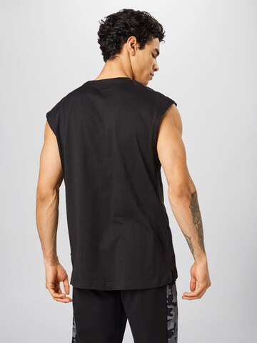 PUMA Sportshirt in Schwarz