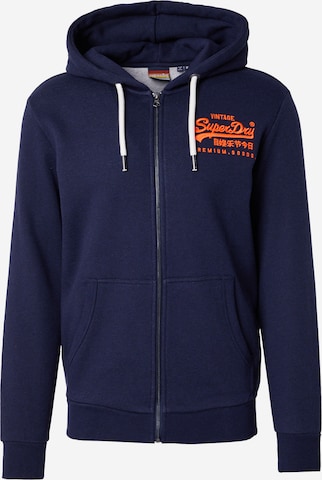 Veste de survêtement Superdry en bleu : devant