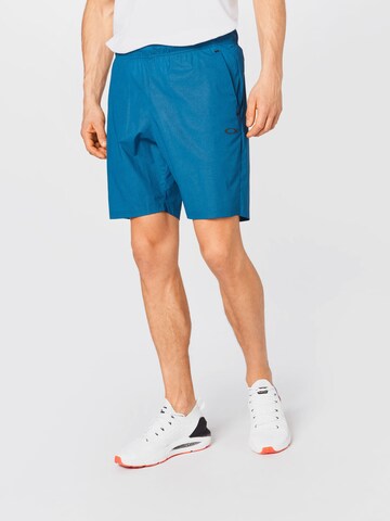 Regular Pantaloni sport de la OAKLEY pe albastru: față