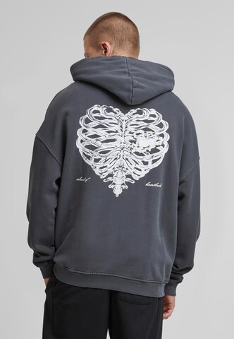 Pequs Sweatshirt 'Island of Heartbreaks' in Grau: Vorderseite
