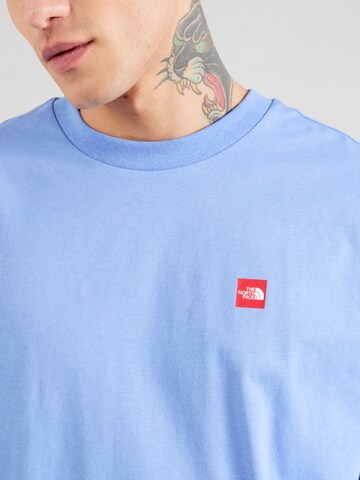 mėlyna THE NORTH FACE Marškinėliai 'AXYS'