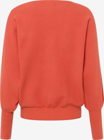 Pullover di zero in arancione