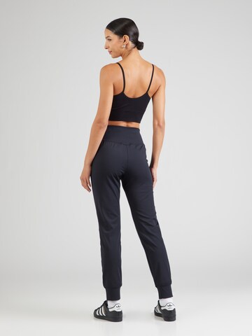 Champion Authentic Athletic Apparel Tapered Sporthose in Schwarz