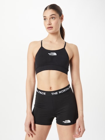 THE NORTH FACE Bustier Sports-BH i svart: forside