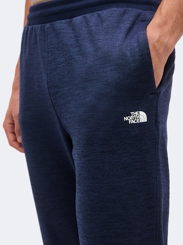THE NORTH FACE Tapered Urheiluhousut värissä sininen