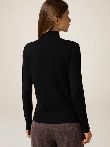 Pullover di oltre in nero