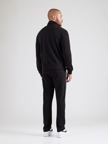 Tuta da jogging di Champion Authentic Athletic Apparel in nero