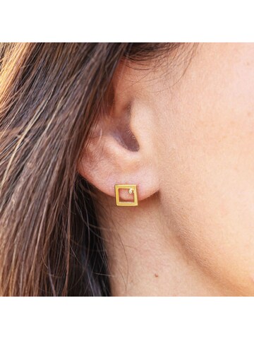 caï Ohrstecker in Gelb: Vorderseite