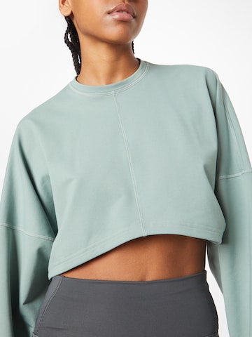 ADIDAS PERFORMANCE - Sweatshirt de desporto 'Studio ' em verde