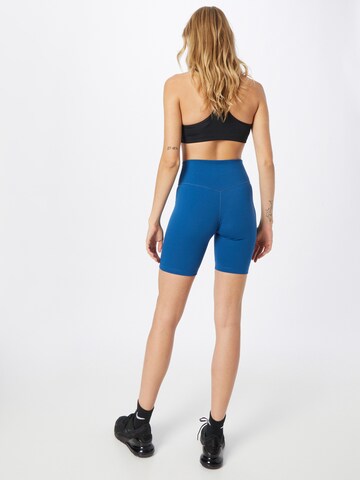 NIKE Skinny Sportbroek in Blauw