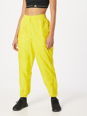 ADIDAS BY STELLA MCCARTNEY Tapered Workout Pants 'Lined Winter' in Yellow: front