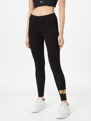 PUMA Skinny Workout Pants in Black: front