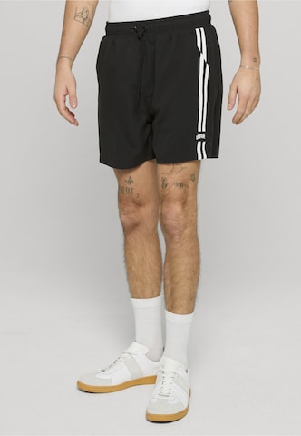 Unfair Athletics Loosefit Shorts 'Woodland' in Schwarz: Vorderseite