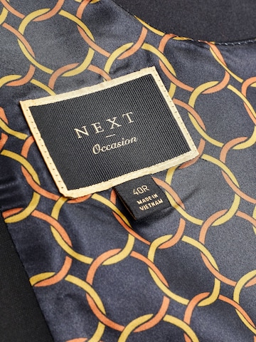 Next - Colete de fato em preto