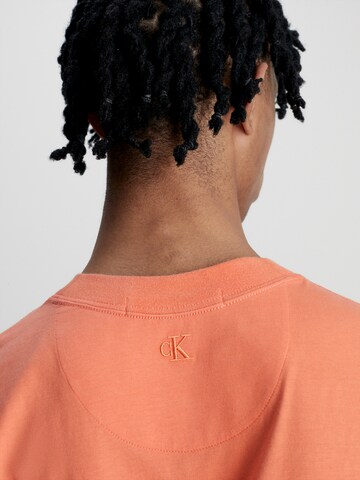 oranžs Calvin Klein Jeans T-Krekls