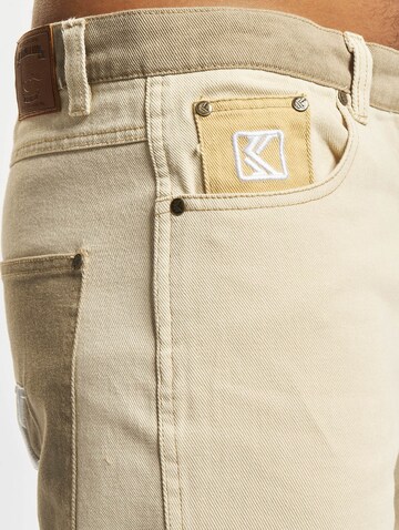 Karl Kani Regular Shorts in Beige