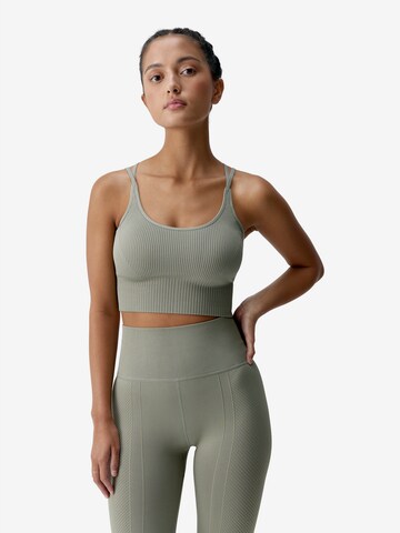 Born Living Yoga Sporttop ' Devika ' in Groen: voorkant