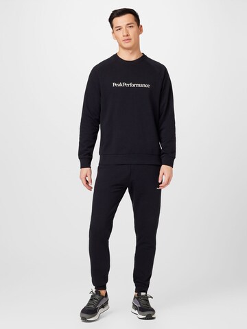 PEAK PERFORMANCE Sport sweatshirt i svart