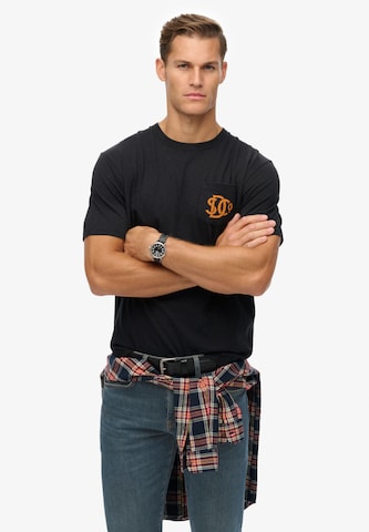 T-Shirt 'The Merchant Store' Superdry en bleu : devant