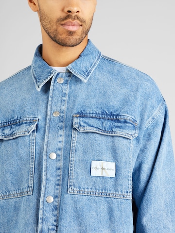 Calvin Klein Jeans Prehodna jakna | modra barva