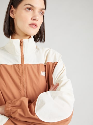 new balance Sportjacke 'Greatest Hit' in Braun