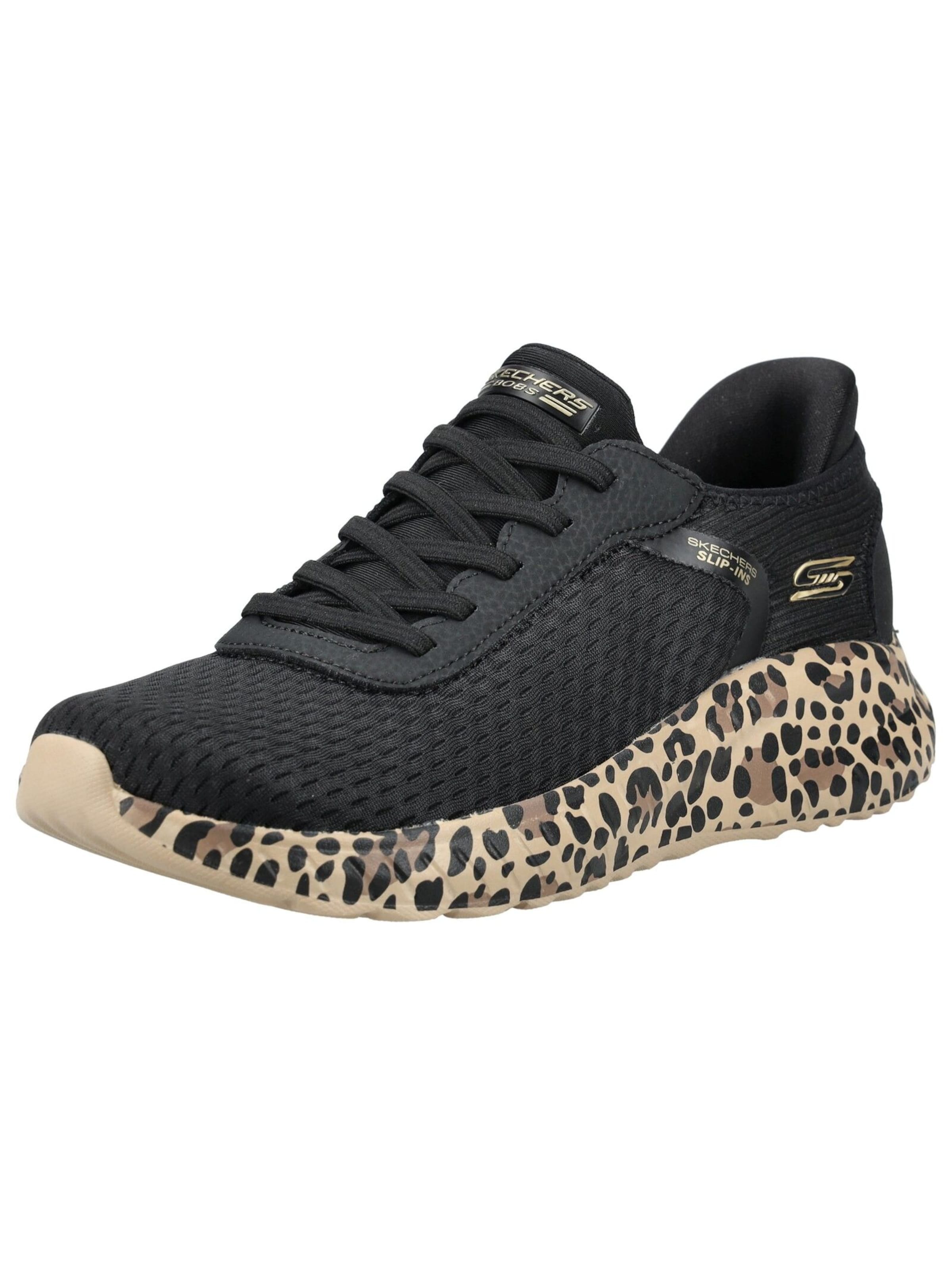 Baskets basses SKECHERS en noir : devant