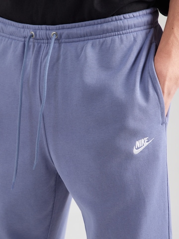 Nike Sportswear Tapered Broek 'Club Fleece' in Blauw