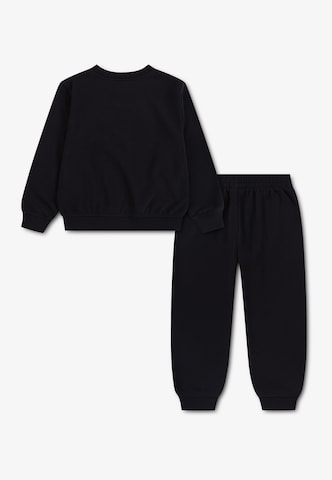 Nike Sportswear - Ropa para correr 'FUTURA' en negro