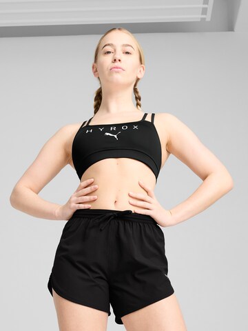 PUMA Bralette Sports Bra 'Puma x Hyrox' in Black: front