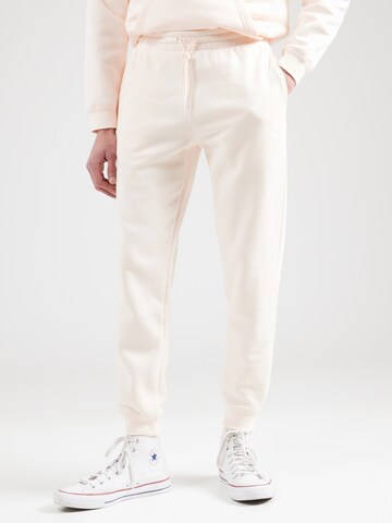CONVERSETapered Hlače - roza boja: prednji dio