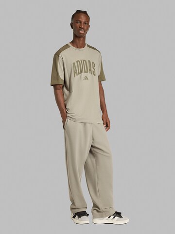 ADIDAS SPORTSWEAR Voľný strih Športové nohavice 'COLLEGIATE' - Sivá