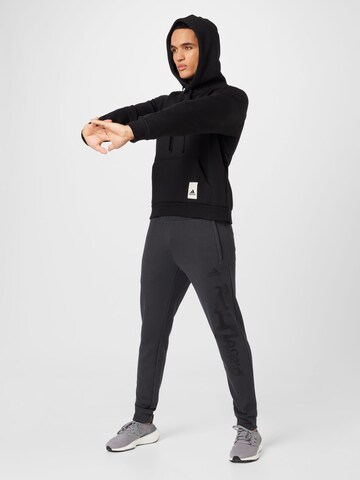 ADIDAS SPORTSWEAR Sportsweatshirt 'Lounge Fleece' i svart