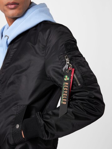 Geacă de primăvară-toamnă de la ALPHA INDUSTRIES pe negru