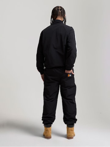 AND1Tapered Hlače - crna boja