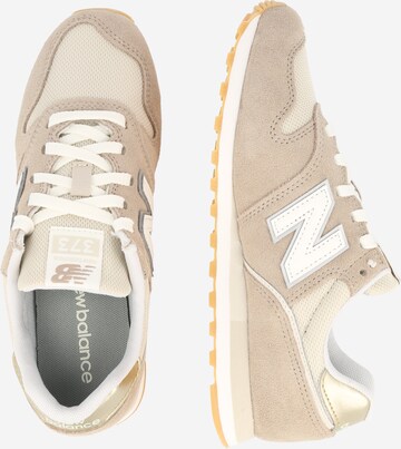 Baskets basses '373' new balance en marron