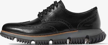 Chaussure de sport à lacets '4.ZEROGRAND WINGTIP' Cole Haan en noir : devant