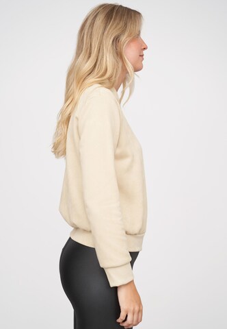 Veste mi-saison Cloud5ive en beige : sur le côté