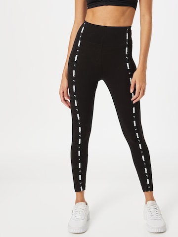 PUMA Skinny Sportbroek in Zwart: voorkant