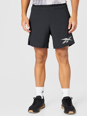 Regular Pantalon de sport 'Strength Graphic 2.0' Reebok en noir : devant