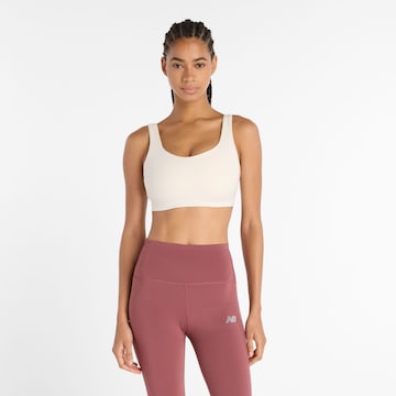 Bustino Reggiseno sportivo 'Harmon' di new balance in bianco: frontale