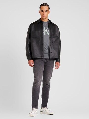 Calvin Klein Jeans Φθινοπωρινό και ανοιξιάτικο μπουφάν σε μαύρο