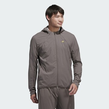 ADIDAS PERFORMANCE Athletic Jacket in Brown: front