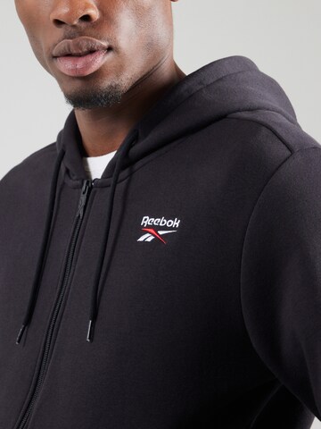 Reebok - Sudadera con cremallera deportiva en negro