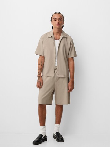 Bershka Regular Shorts in Beige