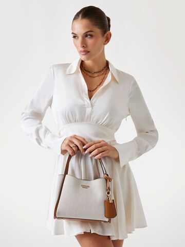 GUESS Handtasche 'Nicolette' in Braun