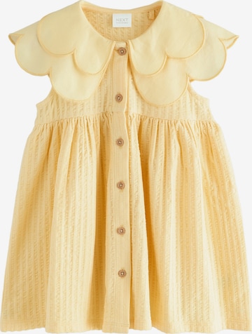 Next Mekko värissä keltainen: etupuoli