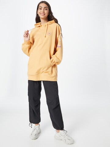 ADIDAS BY STELLA MCCARTNEY Sportsweatshirt 'Pull On- Gender Neutral' in Gelb