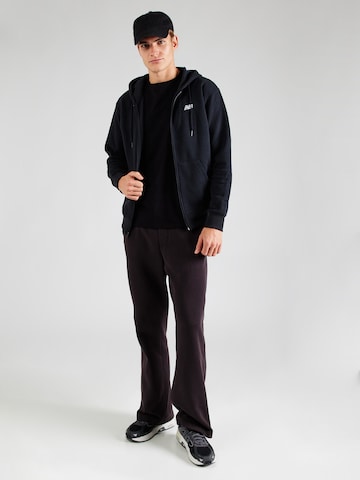 melns new balance Sportiska jaka 'Essentials'