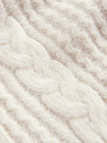 Next Neuletakki värissä beige